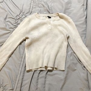 Off white/cream long sleeve kind of cropped worn once and didn’t fit